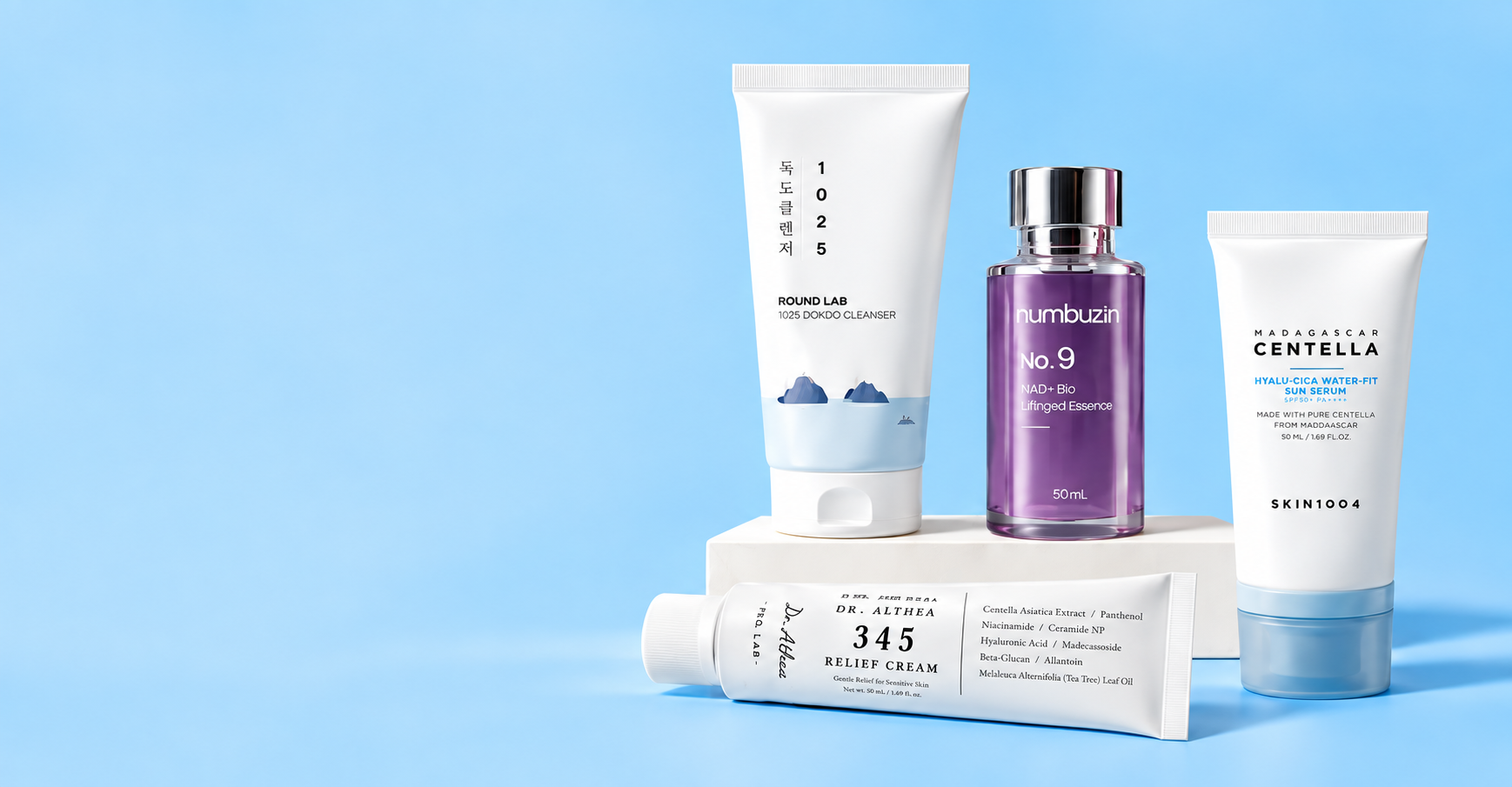 Four Studio Hana essentials arranged on a blue background